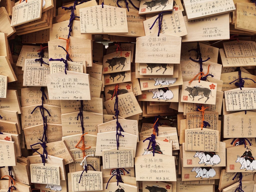 Photo by DLKR on Unsplash. In Japan, Shinto and Buddhist worshippers write wishes on small wooden plaques, called Ema, and hang them for the spirits to receive.